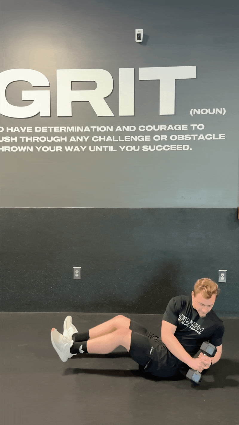 Dumbbell Russian Twist to Overhead Press