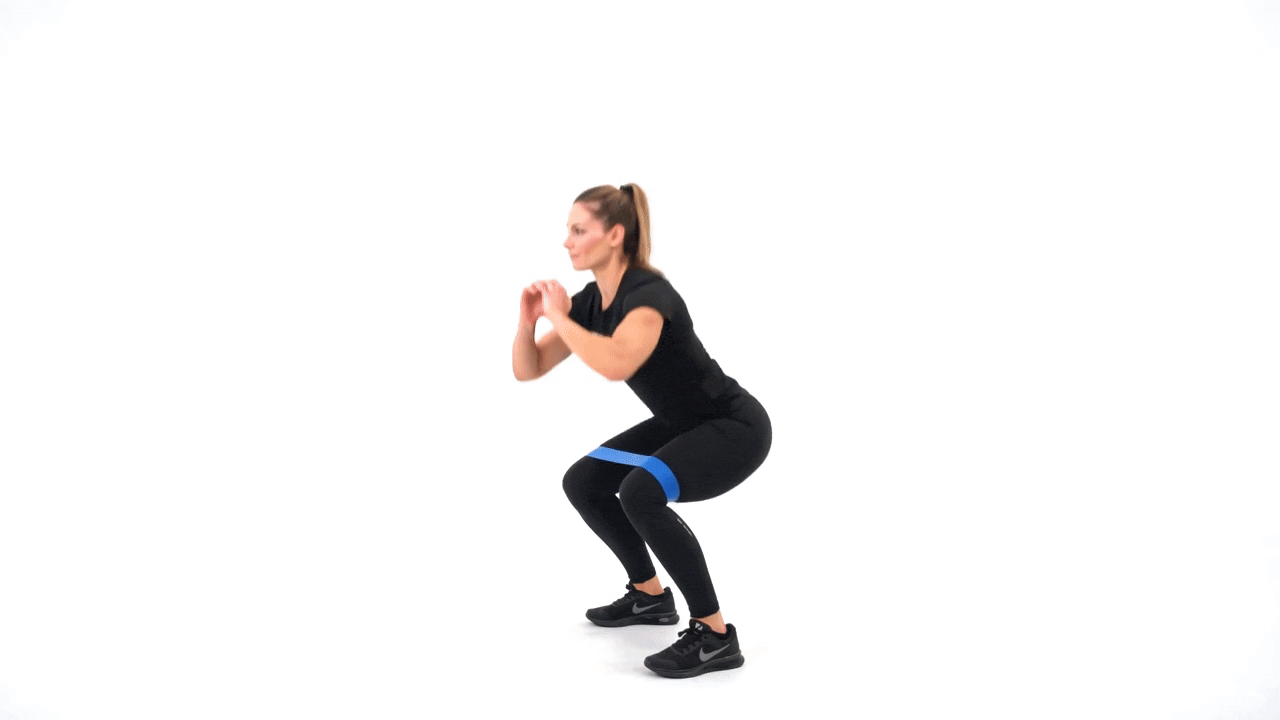 Mini Band Squat to Oblique Crunch band above knee