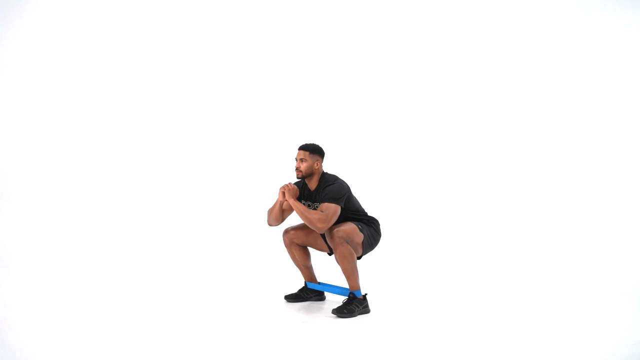 Mini Band Squat to Oblique Crunch band around feet