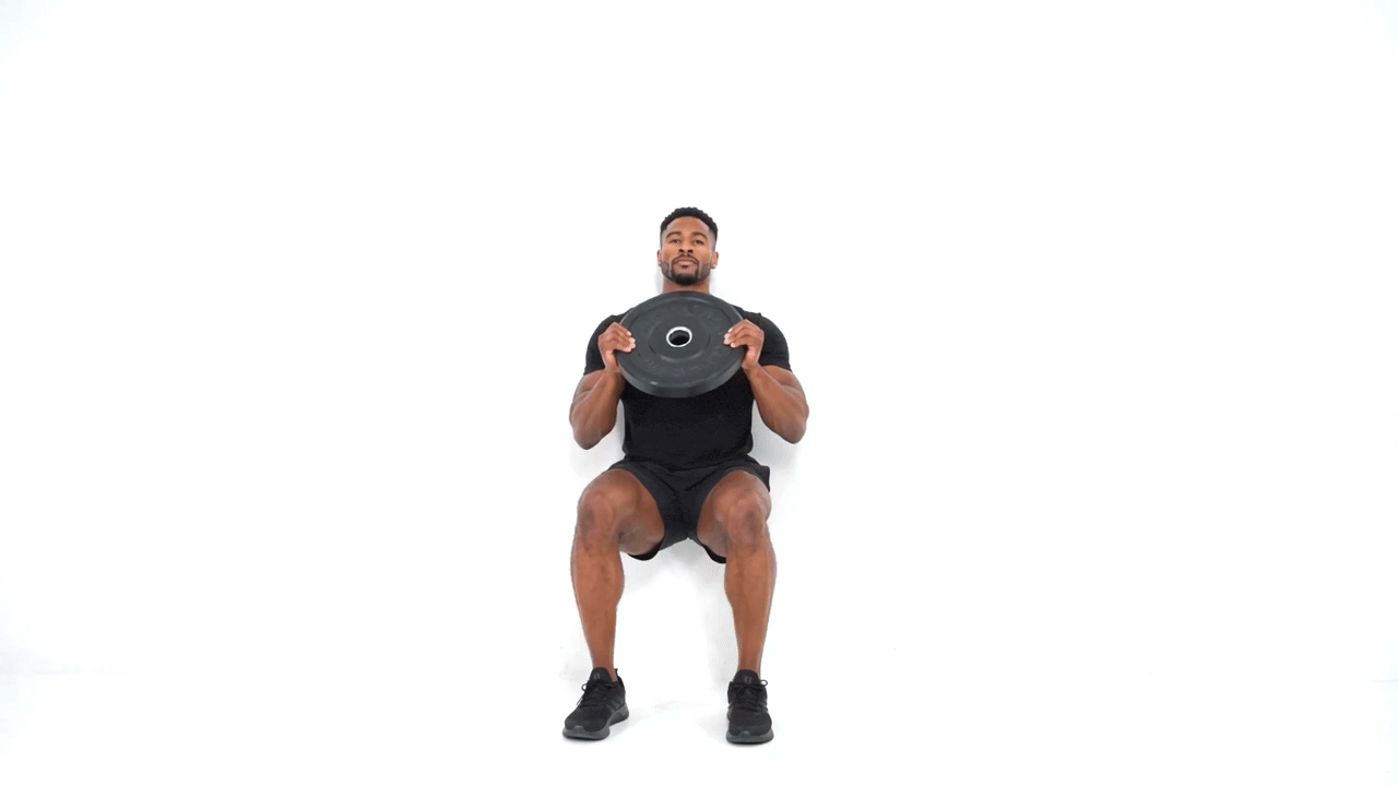Wall Sit Plate Overhead Press